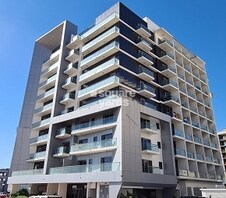 L Avenue Building Featured Image