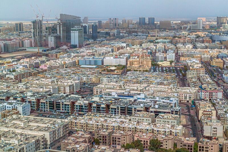 Al Karama_a cityscape of a city with tall buildings