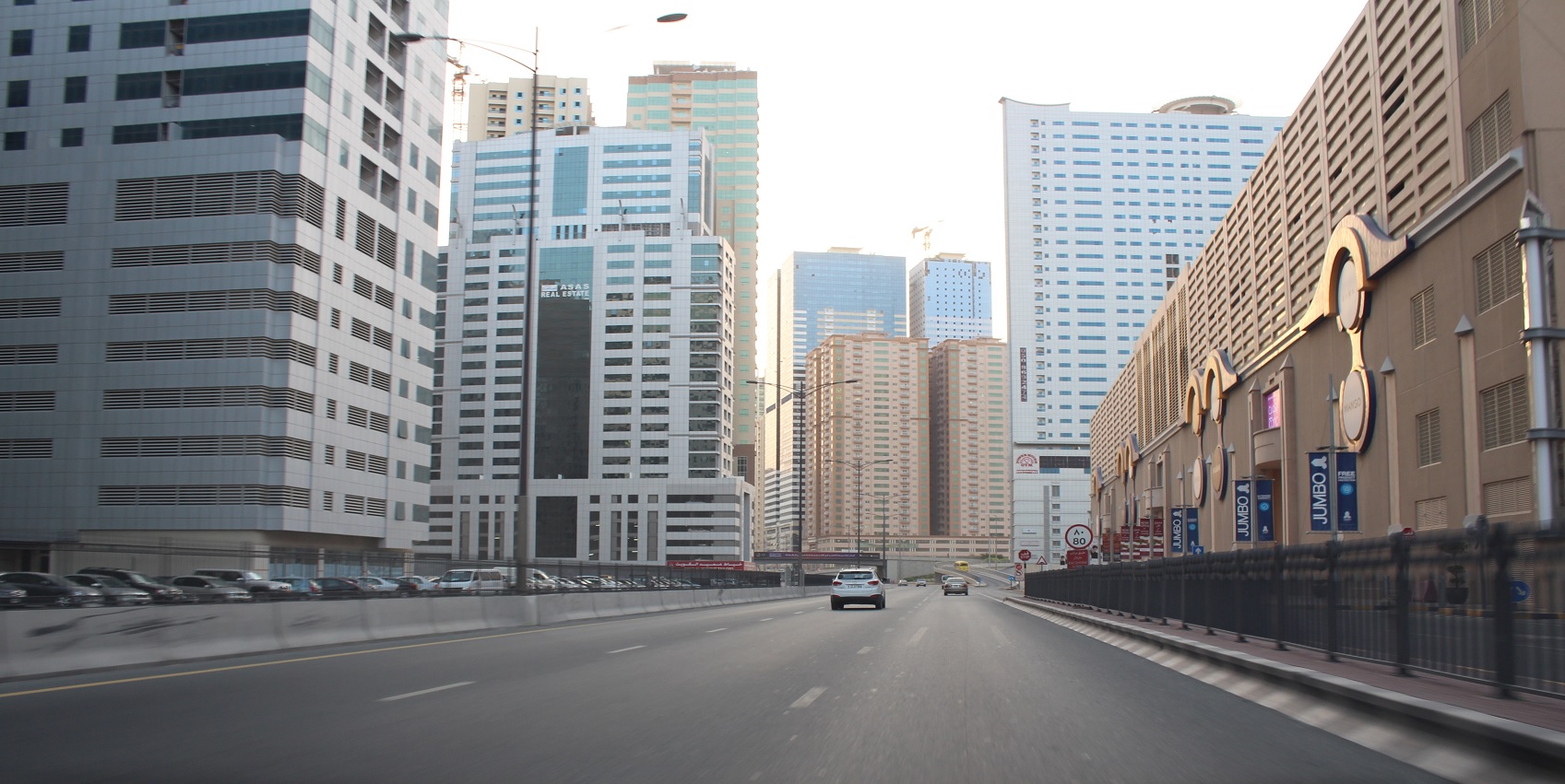 Al Nahda (Dubai)_a city street filled with lots of tall buildings