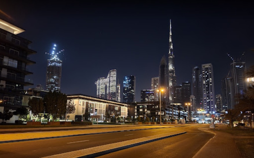 Al Wasl_a city street filled with lots of tall buildings