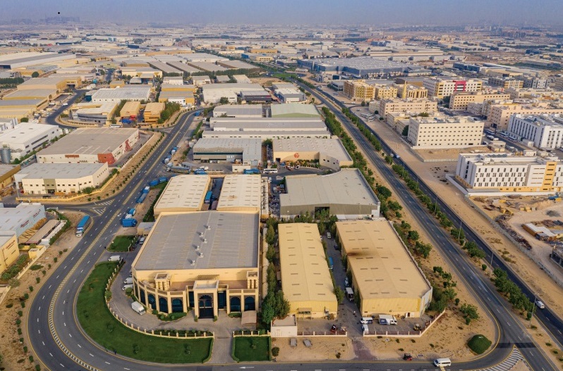 Dubai Investment Park (DIP)_a large building with a lot of traffic on it