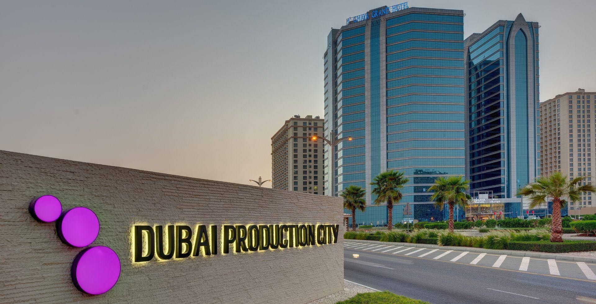 Dubai Production City (IMPZ)_a building with a sign on it