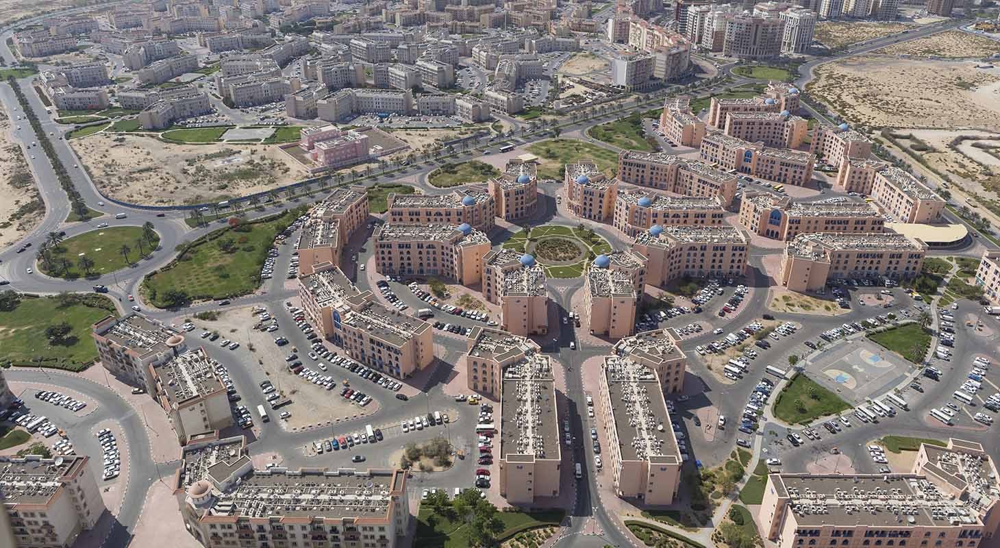 International City_a large building with a clock on it