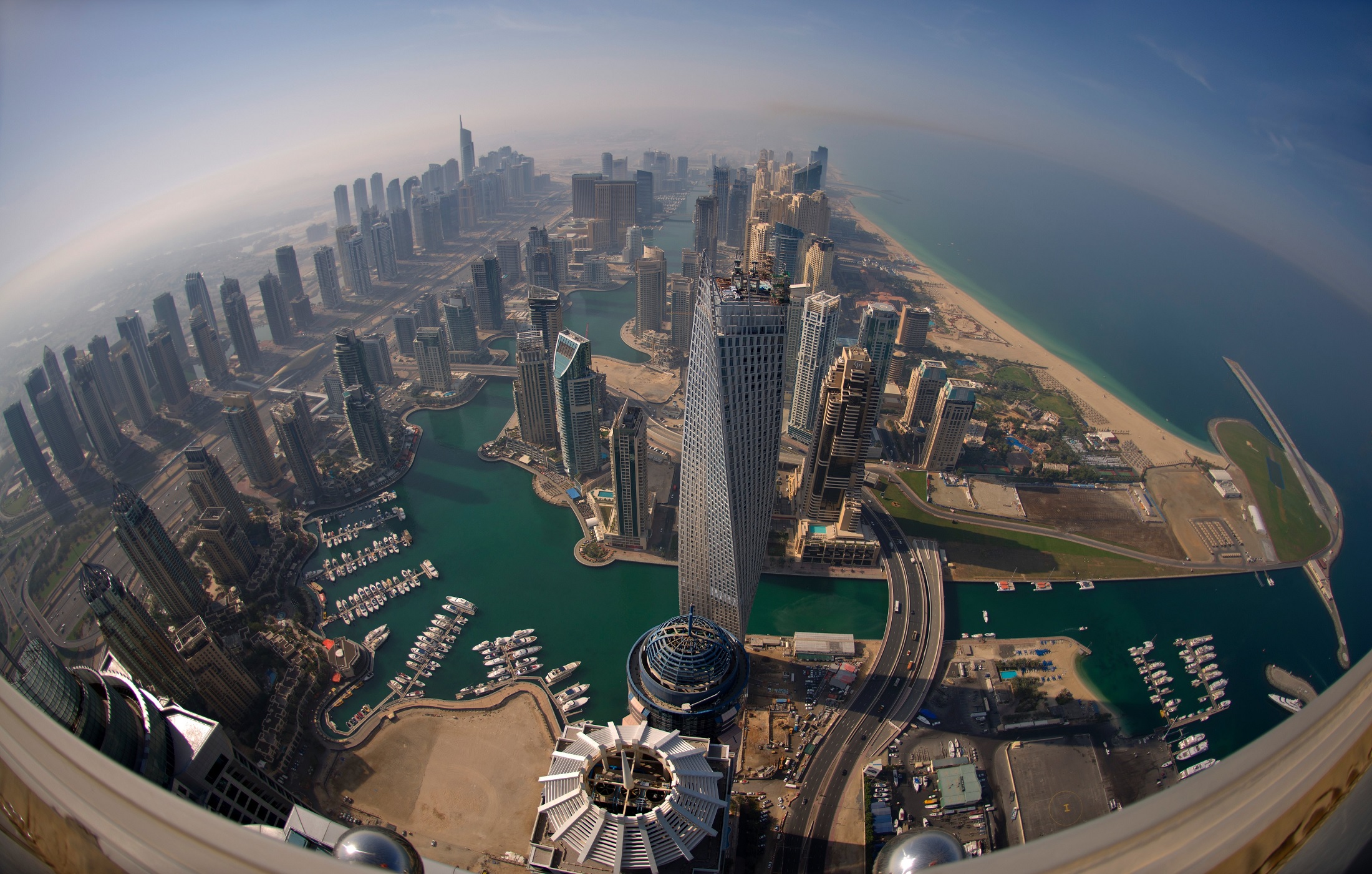 Jumeirah Beach Residence (JBR)_an aerial view of a city with a large body of water
