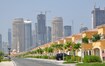 Jumeirah Park_a city street filled with lots of tall buildings