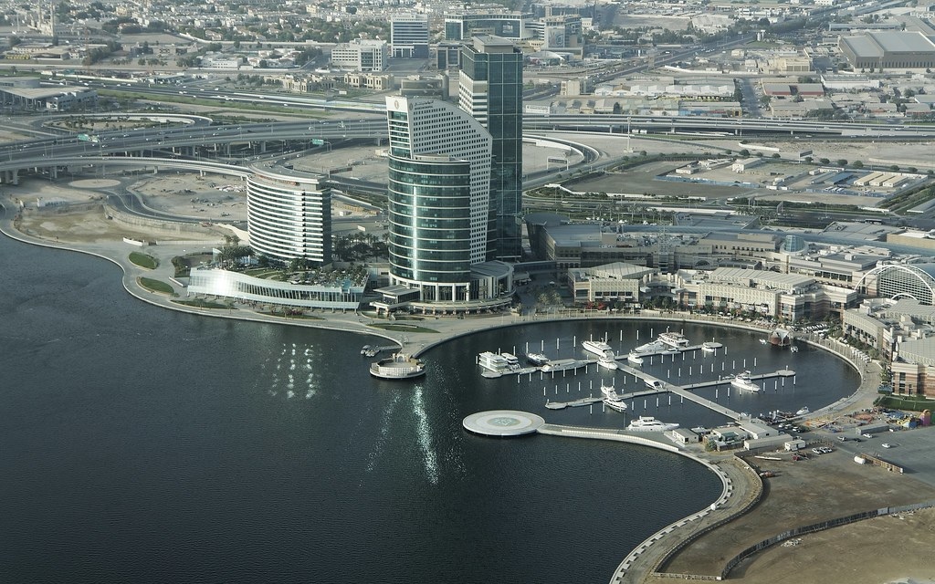 Umm Ramool_a large body of water with a bridge over it