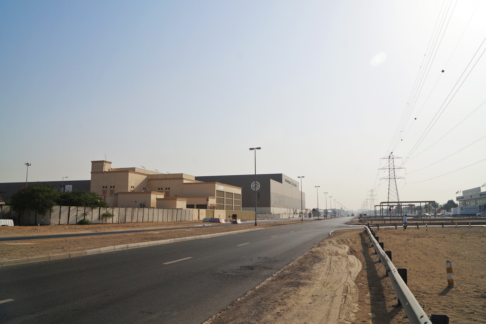 Umm Ramool_a large building with a train on the tracks