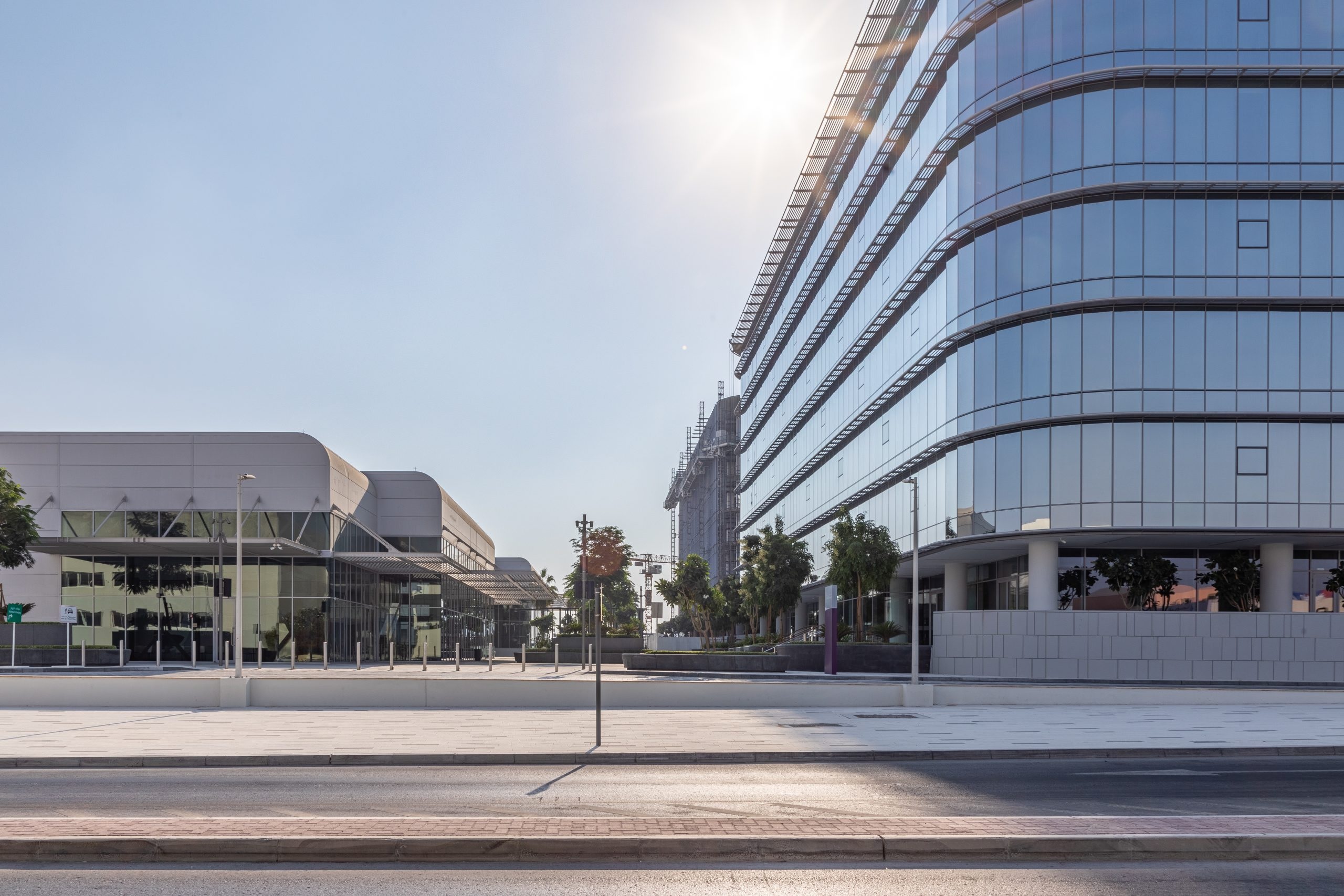 Umm Ramool_a large building with a clock on the side of it